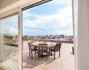 Enjoy the sunny terrace at La Bohme fifth, a vacation home in Koksijde, West Flanders with beautiful views of the city.