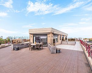 Spacious roof terrace of La Bohme fifth vacation home in Koksijde, West Flanders, with panoramic views and comfortable seating.