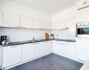 Modern kitchen in Lysa fourth vacation home, Koksijde, West Flanders. Stylish decor and full equipment for comfortable stay.