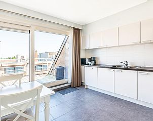 Lysa fourth vacation home in Koksijde, West Flanders with modern kitchen and view of sunny terrace.