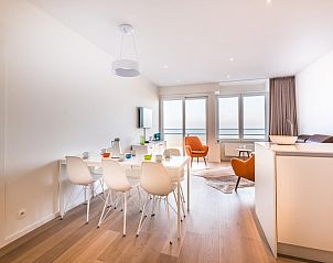 Stylish living room in LaVue Deux vacation home, Koksijde, Belgium with sea view and modern decor.