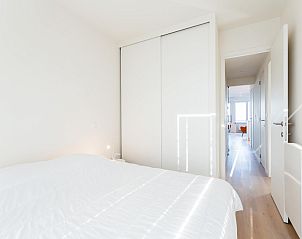 Attractive bedroom of vacation home LaVue Deux in Koksijde, West Flanders, with modern interior and lots of natural light.