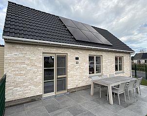 Genieen Sie die sonnige Terrasse des Ferienhauses Westhinder II H23 in Koksijde, Westflandern, mit moderner Ausstattung und groem Auenbereich.