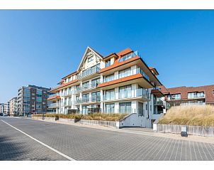 Vue Dunes vakantiehuis in Koksijde, Belgi met moderne architectuur en nabijgelegen duinen voor een ontspannen verblijf aan de kust.