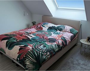 Moderne Kche im Ferienhaus Westhinder I H36, Koksijde, Westflandern, mit stilvoller Einrichtung und gemtlicher Essecke.