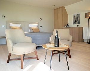 Comfortabele slaapkamer in Vakantiehuisje in Houthulst, West-Vlaanderen, met luxe inrichting.