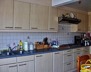 Cozy kitchen of vacation home Katica in Bredene, West Flanders with modern amenities
