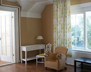 Gerumiges Zimmer in der Villa Vacuna am Meer, belgische Kste, mit gemtlicher Sitzecke und viel Licht.