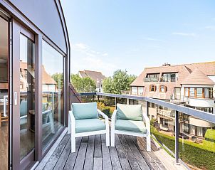 Geniet van het uitzicht vanaf het terras van vakantiehuis Donny in De Panne, West-Vlaanderen, perfect voor een ontspannen verblijf.