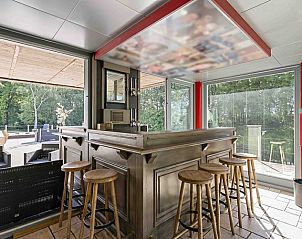 Indoor bar overlooking nature at vacation home Ren in Lichtervelde, West Flanders.