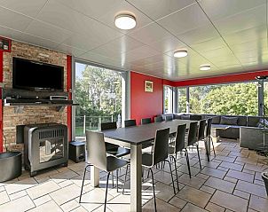 Spacious dining room with modern decor in vacation home Ren, Lichtervelde.