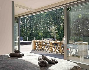 Bedroom with terrace view in vacation home Ren, Lichtervelde, West Flanders.