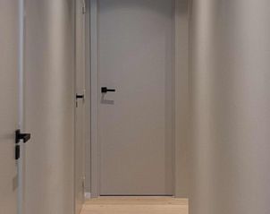 Sleek hallway in Residence Commodore No. 135, apartment in Knokke, West Flanders, Belgium with modern finishes.