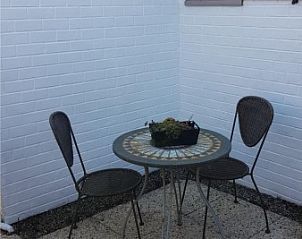 Cozy sitting area in cottage for 6 people in Bredene, West Flanders with fireplace.