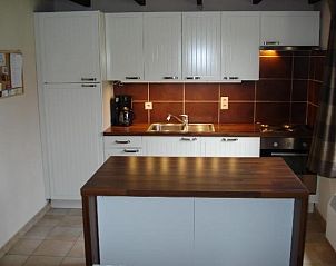 Comfortable bedroom in cottage for 6 people in Bredene, West Flanders with two beds.