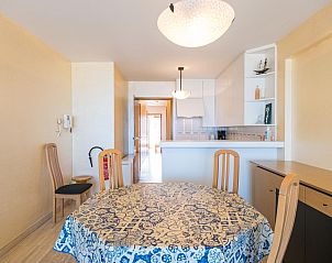 Cozy dining area in Azur Palace - 0602, a vacation home in Middelkerke, West Flanders, Belgium with modern kitchen and atmospheric lighting.