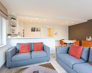 Cozy dining area in Duindal I - 0201, a vacation home in Middelkerke, West Flanders. Modern furnishings with maritime decorations.