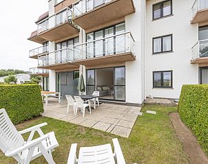 Bright living room in vacation home Green Garden block 7 - 0002 box 134 in Middelkerke, West Flanders overlooking terrace and garden.