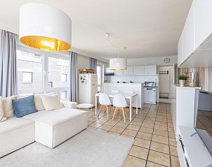 Stylish living room of vacation home Kwintebank - 0904 in Middelkerke, West Flanders, with modern decor and lots of natural light.