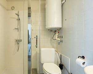 Modern bathroom in Apartment Ref. 704, Bredene, West Flanders, with shower and toilet, ideal for a comfortable stay at the seaside.