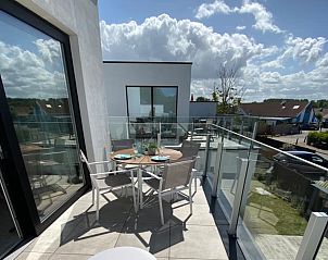 Enjoy the sun-drenched terrace at Holiday Home De Garnaal in Bredene, West Flanders, with stunning views of the surroundings.