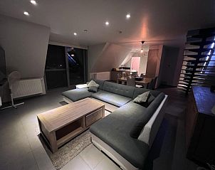 Stijlvol appartementinterieur bij / in Bevere, Oost-Vlaanderen, Belgi, met ruime woonkamer en moderne inrichting.