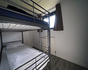 Gezellige slaapkamer met stapelbed in Chalet in Mol, vakantiehuis in Mol, Antwerpen, Belgi, ideaal voor een familievakantie.