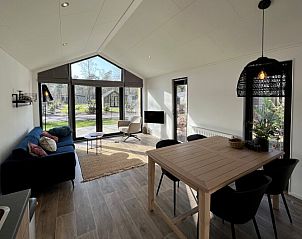 Gezellige slaapkamer in Chalet in Mol, Antwerpen, Belgi met comfortabel tweepersoonsbed en moderne inrichting.