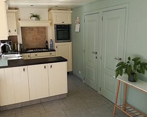 Modern kitchen in Holiday home in Oud-Turnhout, a cozy residence in Antwerp, Belgium.