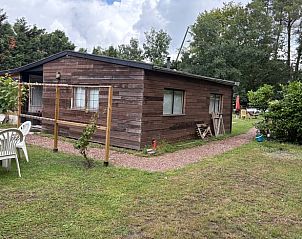 Vakantiehuis in Essen Wildert, Antwerpen: charmant houten vakantiehuis met groene tuin, ideaal voor een ontspannen verblijf in de natuur.