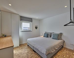 Bright bedroom in Sahara119 vacation home, Lommel, Limburg with modern decor.