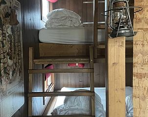 Gezellige houtkachel in Huisje in Maaseik, vakantiehuis in Neeroeteren, Limburg, Belgi, voor een warme en knusse sfeer.