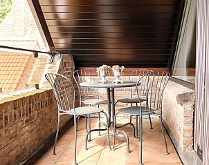 Privterras in Pietershuis Kinrooi vakantiehuis, ideaal voor buiten dineren en genieten van de frisse lucht.