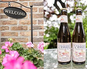 Welkom bij Pietershuis vakantiehuis in Kinrooi, met lokale bieren en kleurrijke bloemen.