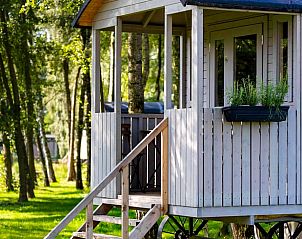 Charmant vakantiehuisje in Kinrooi met veranda in het bosrijke Limburg, Belgi.