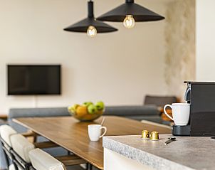 Modern kitchen in Mooi Zutendaal, 6-person wellness villa in Limburg, Belgium, with stylish faucet and luxurious interior.