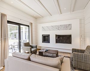 Cozy living room in Mooi Zutendaal 4-person villa, located in Limburg, Belgium. Enjoy comfort and nature in this beautiful bungalow.