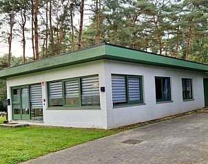 Cottage in Lanaken, a vacation home in Gellik, Limburg, Belgium, surrounded by green nature and restful forests.