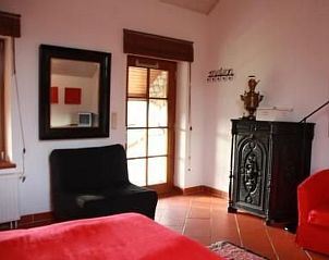 Cozy indoor area of Apartment Vue au Jardin in Hombourg, Ardennes, with stylish decor and garden views.