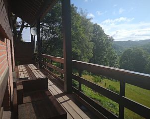 Veranda of Sur les thiers vacation home in Trou de Bra, Ardennes, with beautiful views of nature.