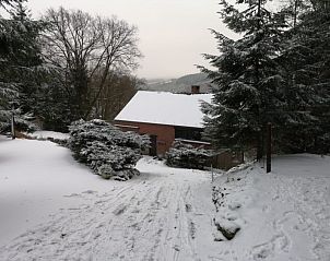 Winter landscape at Sur les thiers vacation home in Trou de Bra, Ardennes, covered with snow.