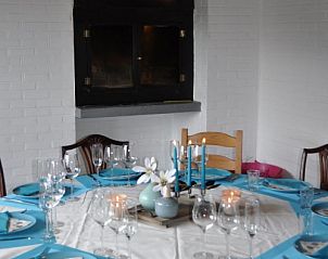 Cozy dining room in Sur les thiers cottage, Trou de Bra, Ardennes, with set table.