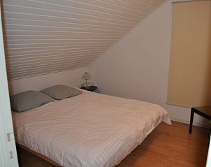 Cozy bedroom in Sur les thiers cottage, Trou de Bra, Ardennes, with comfortable bed.