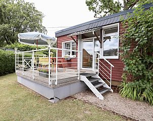 Charmante chalet Sous les Hetres in Robertville, Ardennen, met uitnodigend terras en groene omgeving voor een ontspannen vakantie.
