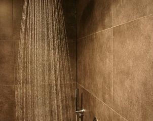 Luxury rain shower in Herresbach vacation home, located in the Ardennes, Belgium.