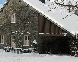 Vacation home in Ottr, charming stone house in snowy Ardennes, Lige, Belgium. Perfect for a winter getaway in nature.
