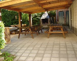 Spacious terrace with barbecue at Maison Del Campo, vacation home in Alle-sur-Semois.