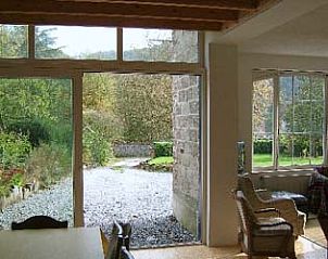View from the living room of vacation home Windsor on the garden in Waulsort, a quiet place in the Ardennes.