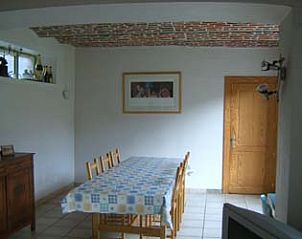 Dining room with rustic charm in vacation home Windsor, perfect for family dinners in Waulsort, Ardennes.