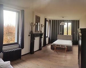 Spacious bedroom in Holiday home for 8 persons in Couvin, Ardennes, Belgium with elegant interior and views of nature.